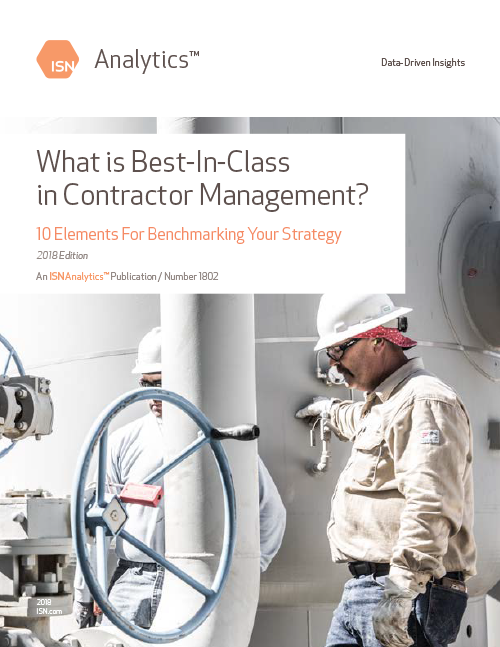 A man in work attire examines equipment while referring to a publication on contractor management strategies.